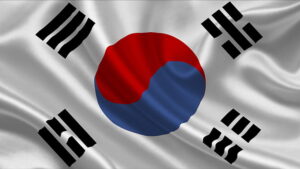 Flag of South Korea with red and blue Taegeuk symbol and four black trigrams on a white background - biochemazone