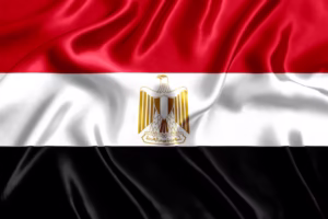 Flag of Egypt with red, white, and black horizontal stripes and the golden Eagle of Saladin - biochemazone